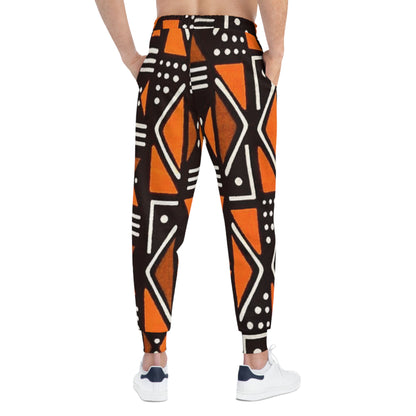 Geometric Orange & Black Athletic Joggers — Tribal Pattern AOP